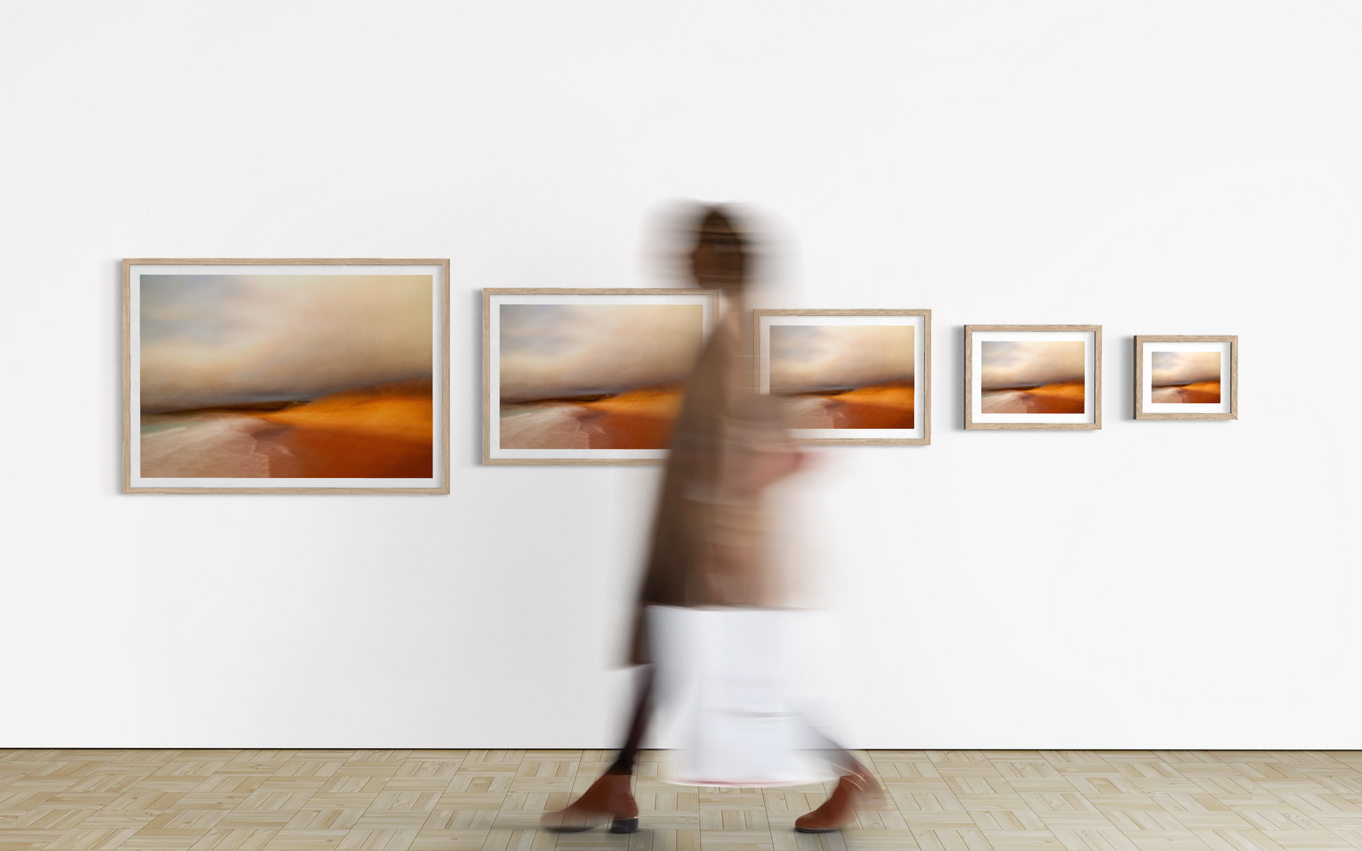 lady viewing art in an exhibition