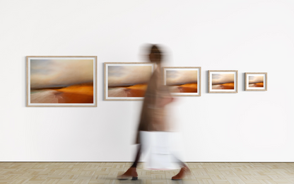lady viewing art in an exhibition