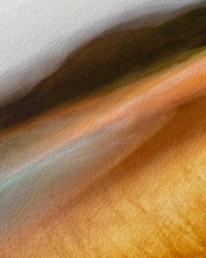 Close-up of seascape wall art with a gradient of colors.